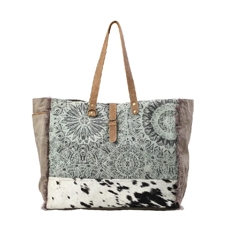 Compact Bags For Minimalist Travelers Black and White Hide Floral Weekender Bag