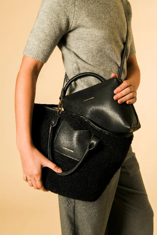 Rustic Bags For Outdoor And Nature-Inspired Looks Sherpa Bucket Bag In Black