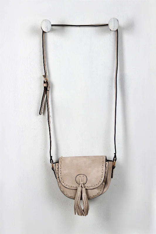 Compact Bags For Minimalist Travelers Vegan Leather Stitch Tassel Mini Bag
